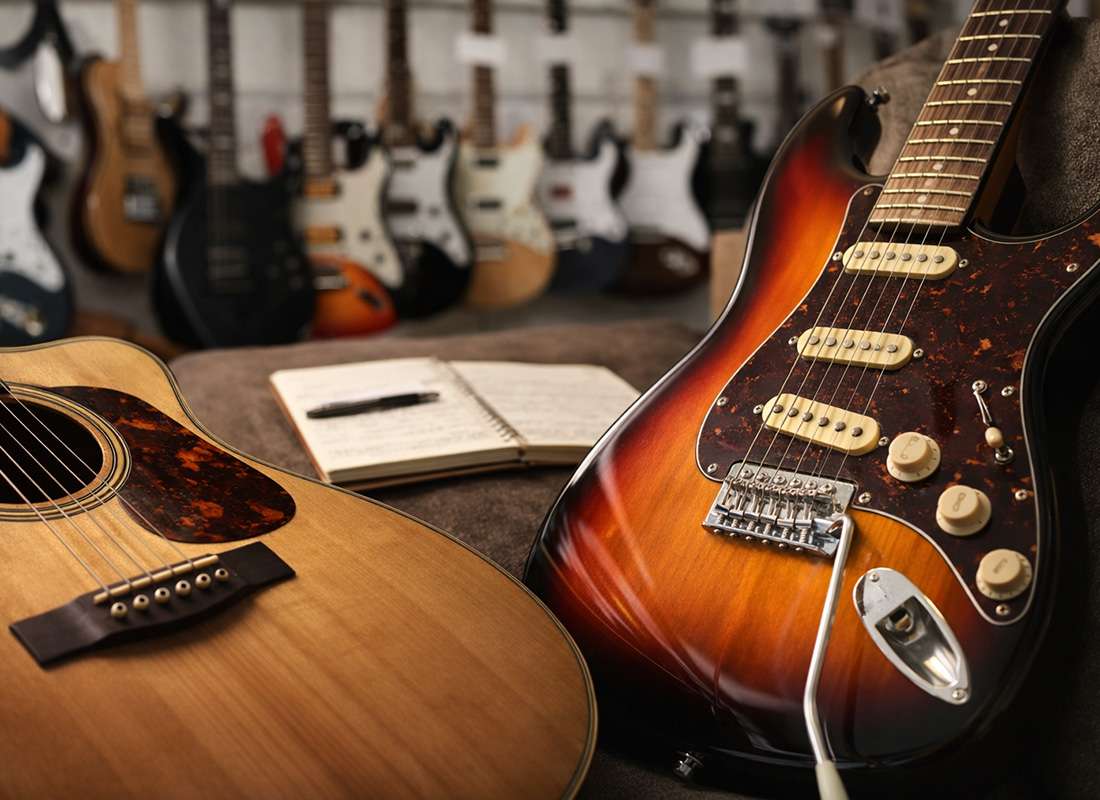 Acoustic and electric guitars used in senior guitar lessons focused on comfort and confidence in La Mesa, California