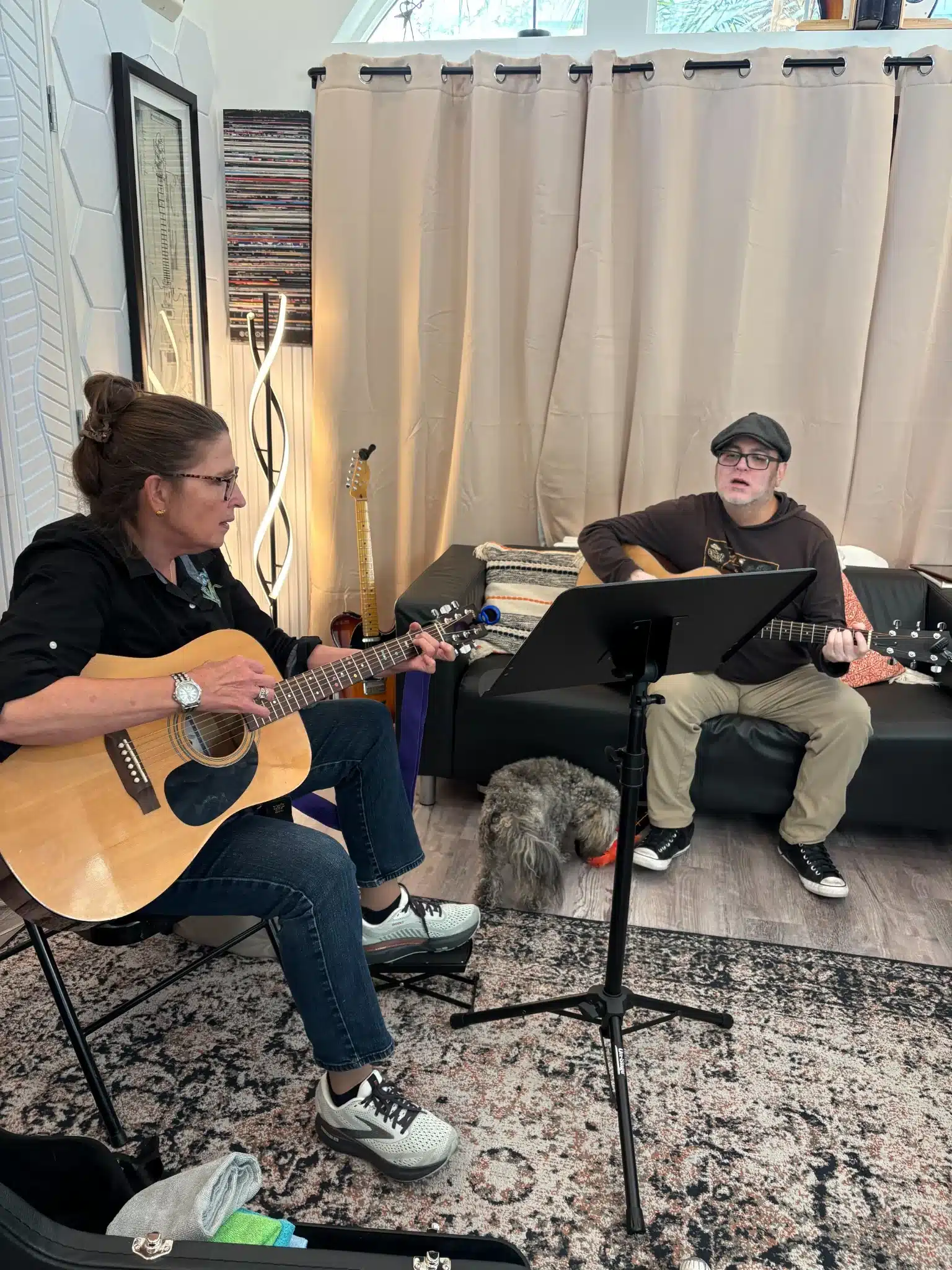 Beginner guitar student learning step by step with an instructor at PlayPro Guitar School in La Mesa