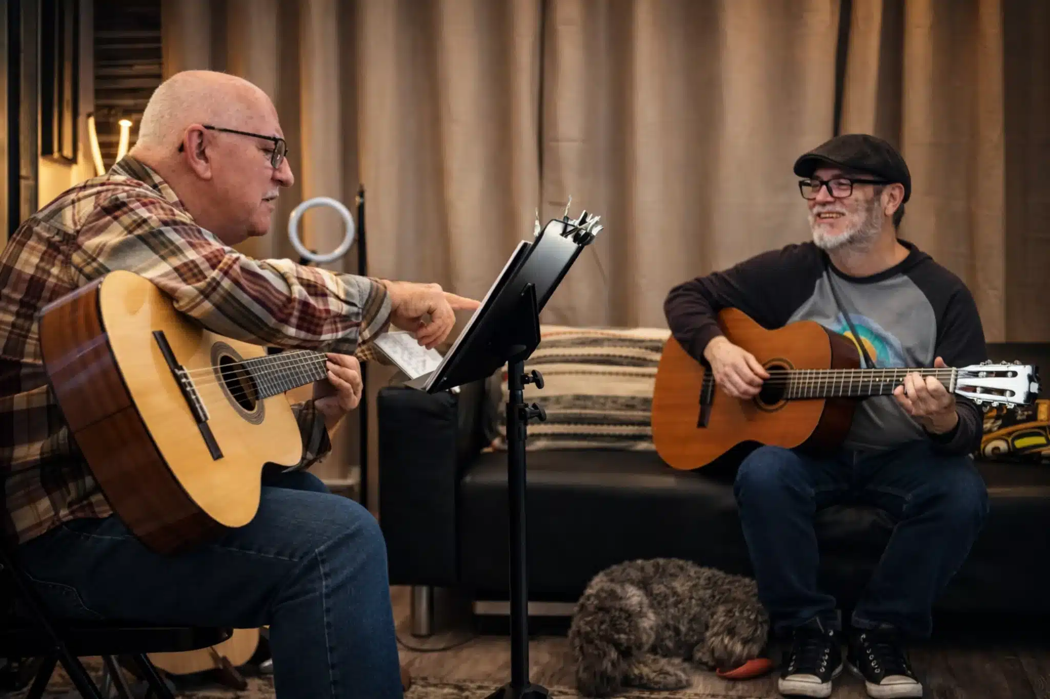 Beginner guitar student learning with clear guidance during a PlayPro Guitar School lesson in La Mesa