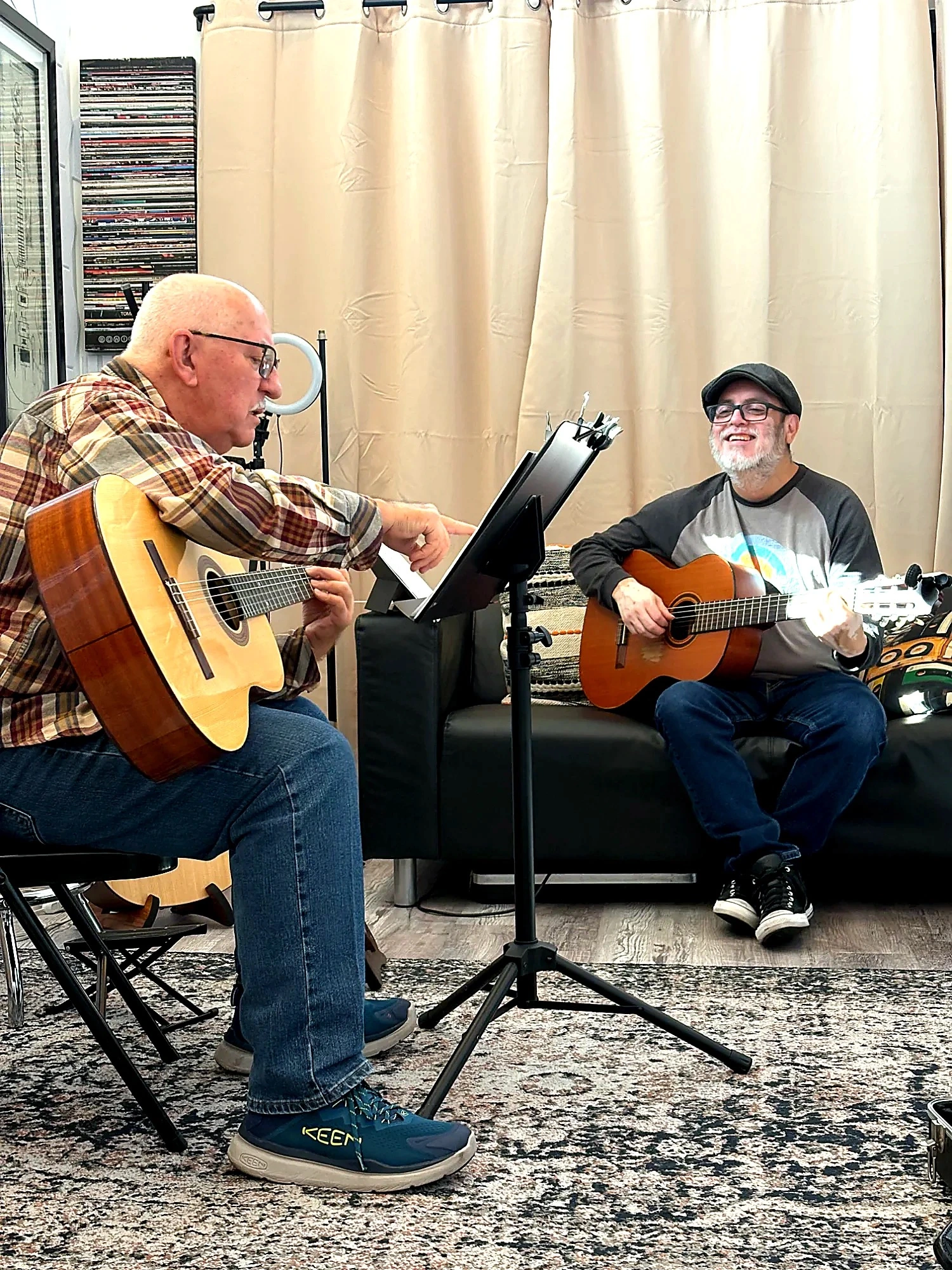 Senior guitar student learning in a relaxed one-on-one lesson at PlayPro Guitar School in La Mesa